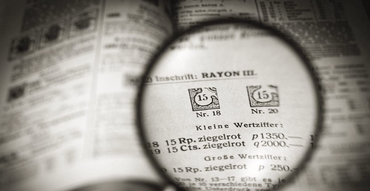 A magnifying glass resting on a printed document
