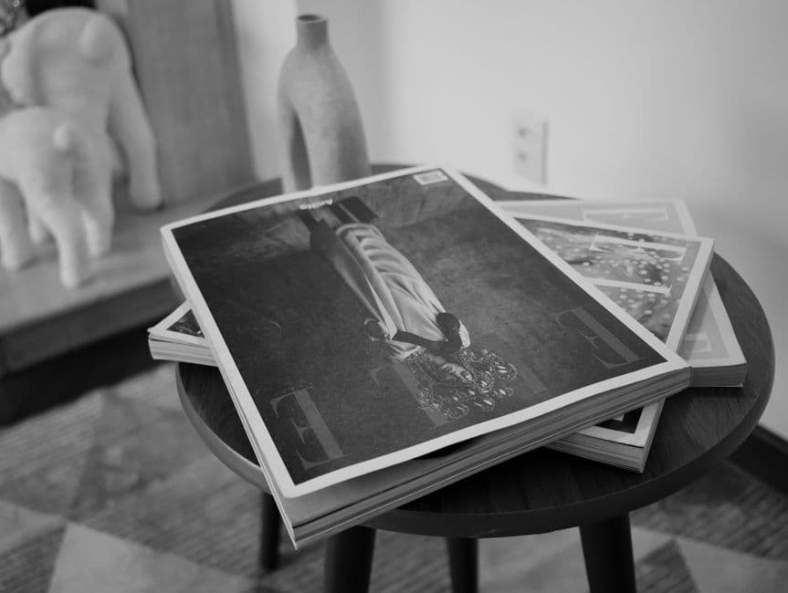 A stack of magazines on a table